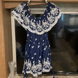 Medium papaya navy blue and white detailed romper